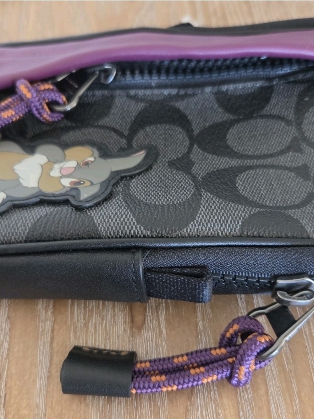 COACH x Disney Thumper North/South Hybrid Zipper Pouch Case Black/Purple - Picture 3 of 5